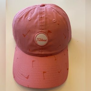 New Titleist adjustable baseball hat. Pink with little tone on tone golf flags.